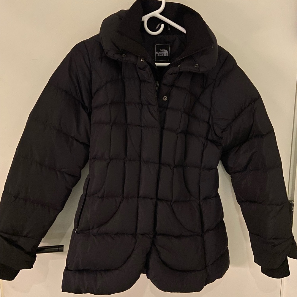North Face woman’s black puffer jacket